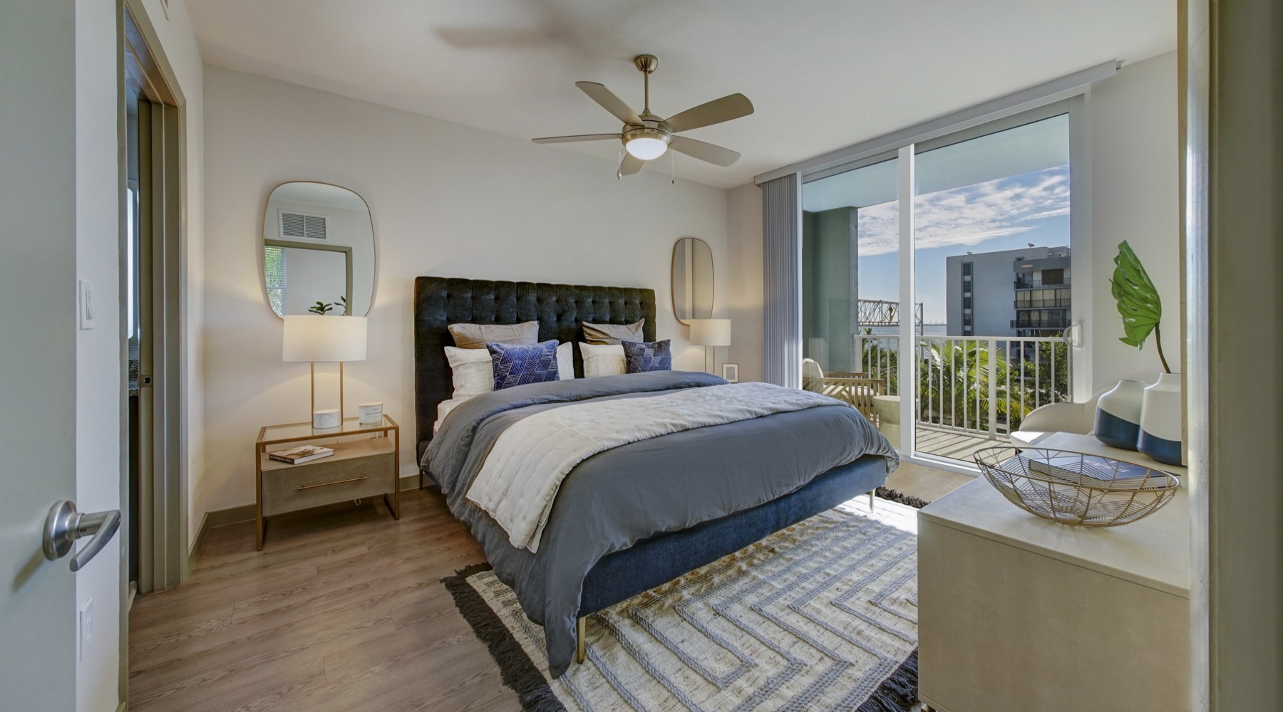 Navette on the Bay Model Unit Bedroom with patio access